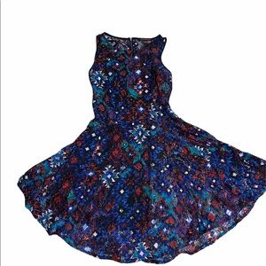 Beautiful fitted, double layered  flowy dress.